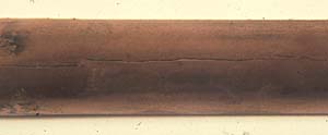 Stress corrosion crack in copper absorber tube
